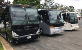 three buses with different paint job