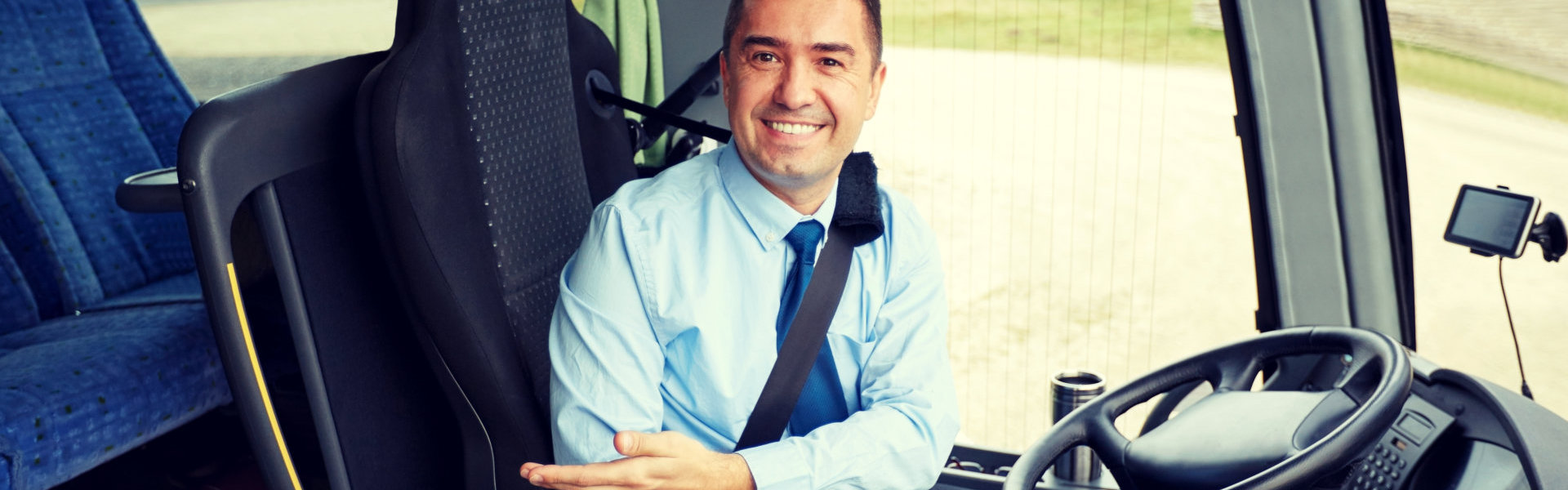 a bus driver man smiling